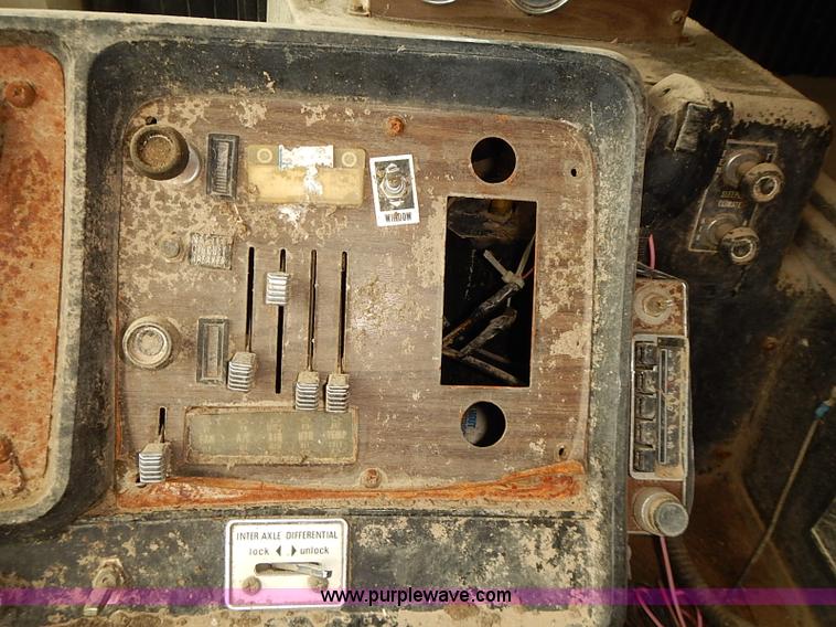 image for item J3092 1975 Chevrolet flatbed truck with crane