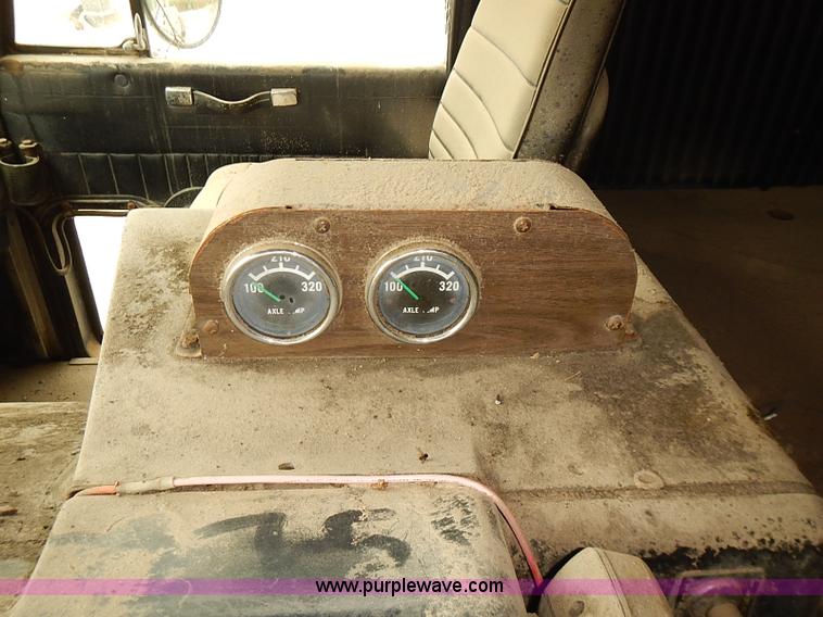 image for item J3092 1975 Chevrolet flatbed truck with crane