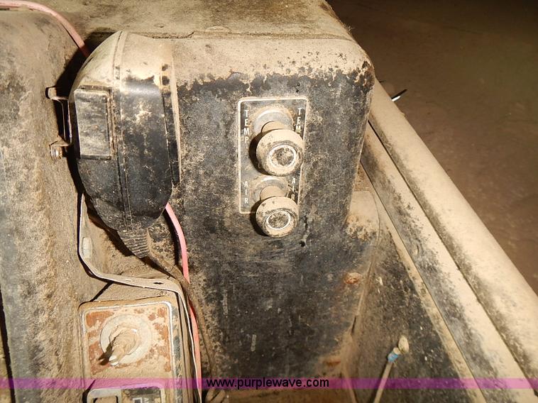 image for item J3092 1975 Chevrolet flatbed truck with crane