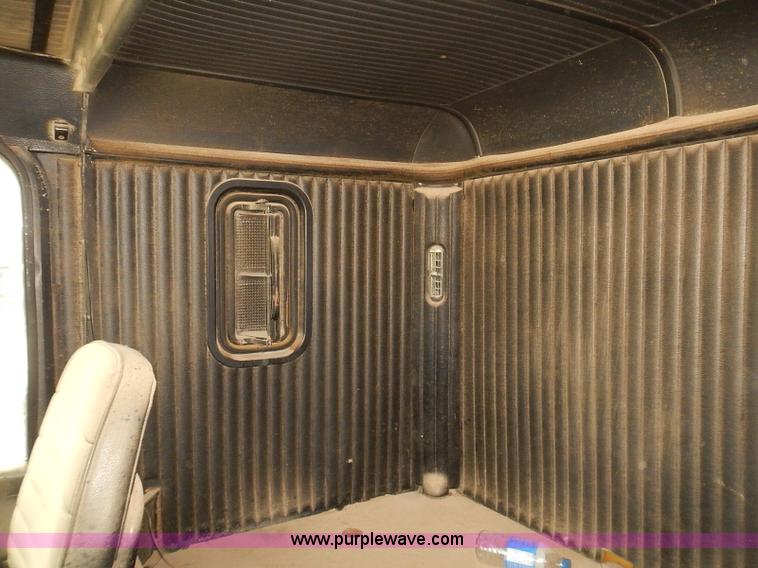 image for item J3092 1975 Chevrolet flatbed truck with crane