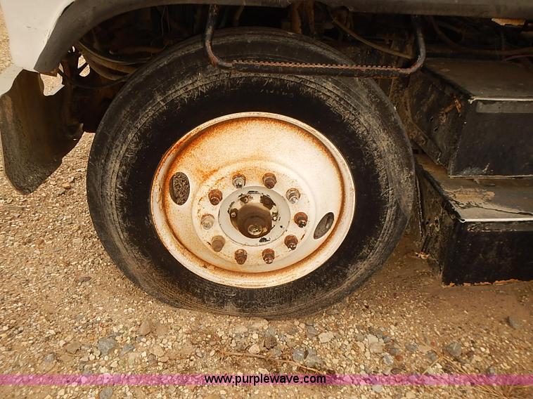 image for item J3092 1975 Chevrolet flatbed truck with crane