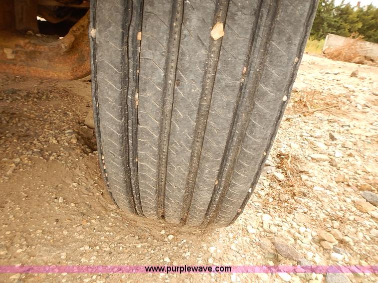 image for item J3092 1975 Chevrolet flatbed truck with crane