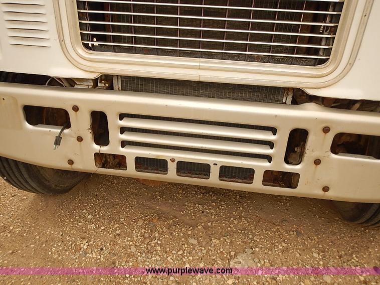 image for item J3092 1975 Chevrolet flatbed truck with crane