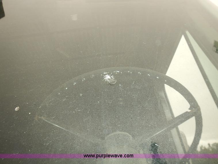 image for item J3092 1975 Chevrolet flatbed truck with crane