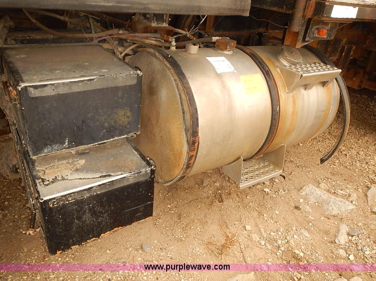 image for item J3092 1975 Chevrolet flatbed truck with crane