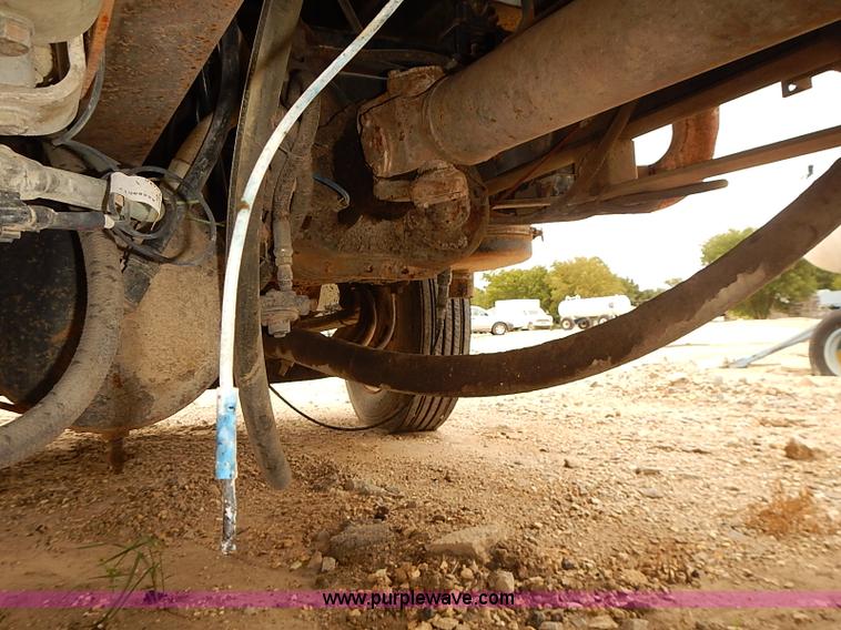 image for item J3092 1975 Chevrolet flatbed truck with crane