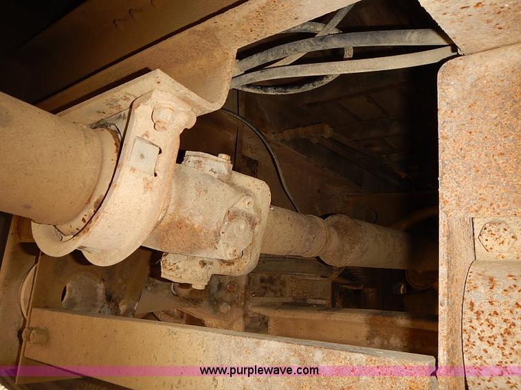 image for item J3092 1975 Chevrolet flatbed truck with crane