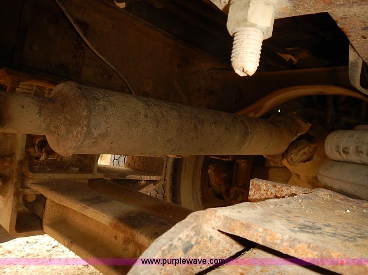 image for item J3092 1975 Chevrolet flatbed truck with crane