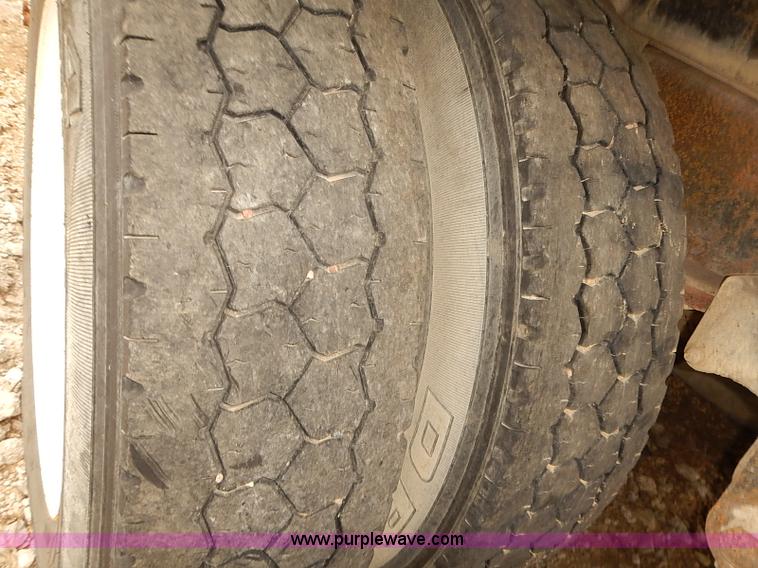 image for item J3092 1975 Chevrolet flatbed truck with crane