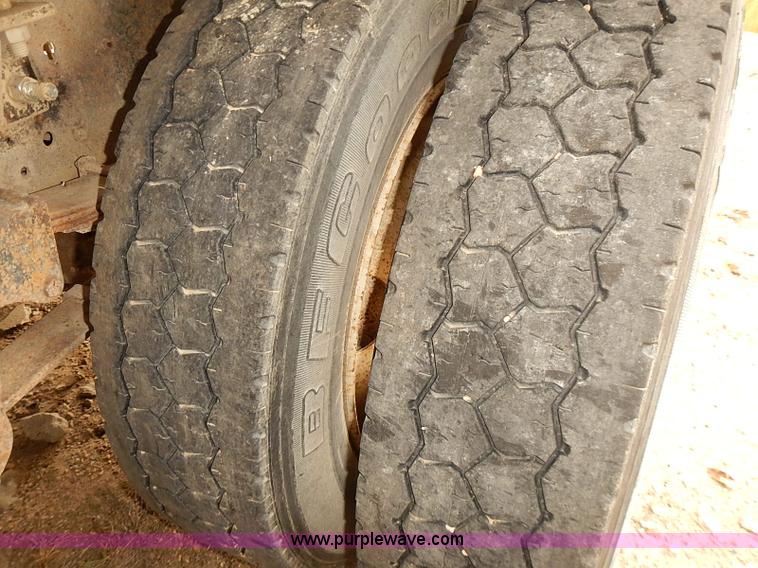 image for item J3092 1975 Chevrolet flatbed truck with crane