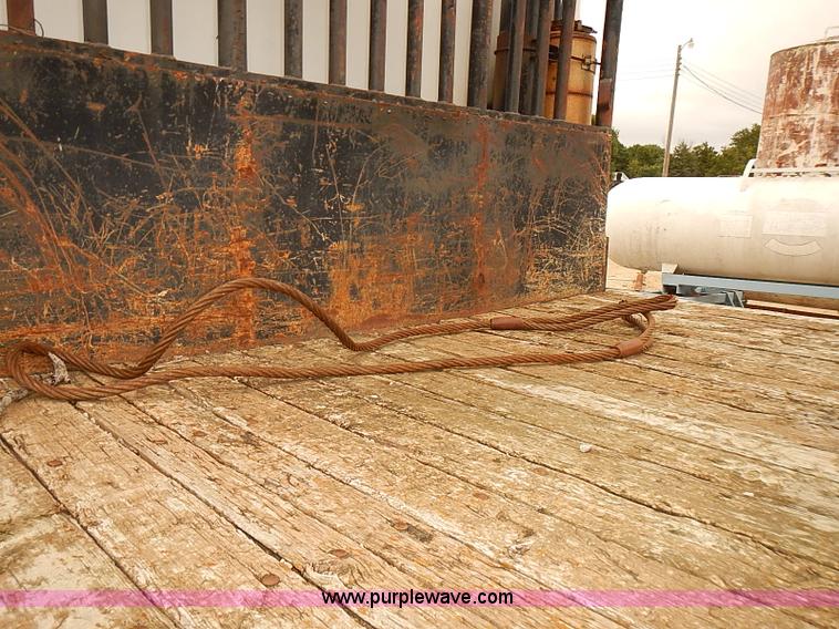 image for item J3092 1975 Chevrolet flatbed truck with crane