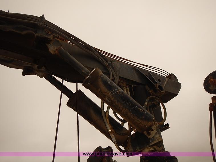 image for item J3092 1975 Chevrolet flatbed truck with crane