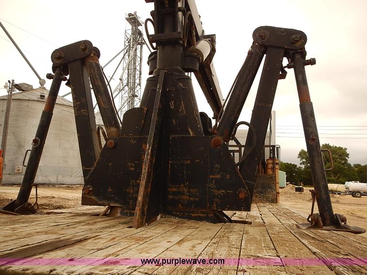 image for item J3092 1975 Chevrolet flatbed truck with crane