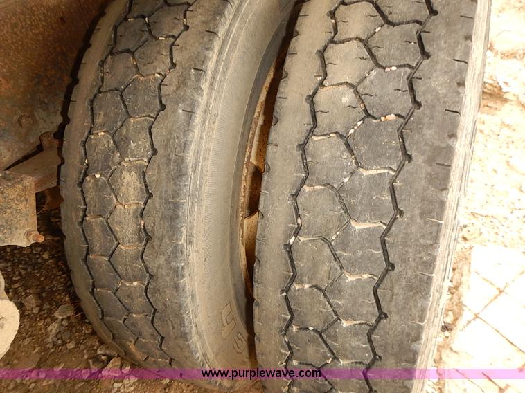 image for item J3092 1975 Chevrolet flatbed truck with crane