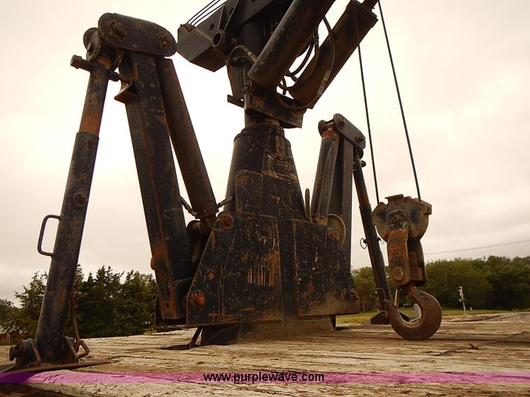 image for item J3092 1975 Chevrolet flatbed truck with crane