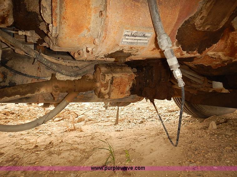 image for item J3092 1975 Chevrolet flatbed truck with crane