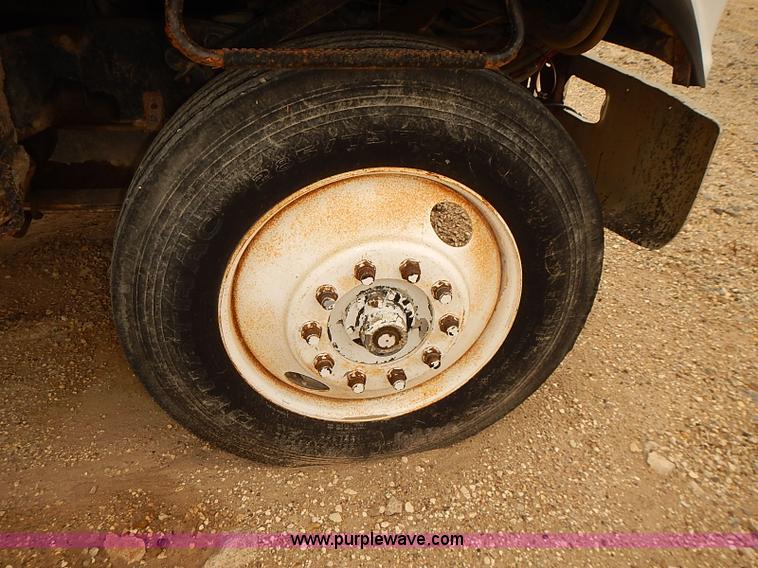 image for item J3092 1975 Chevrolet flatbed truck with crane