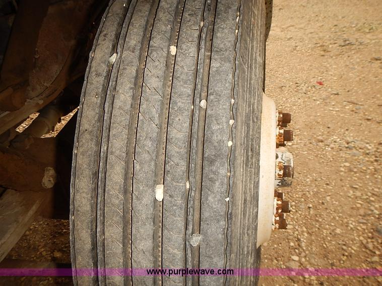 image for item J3092 1975 Chevrolet flatbed truck with crane