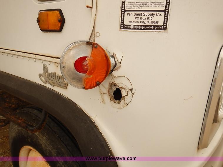 image for item J3092 1975 Chevrolet flatbed truck with crane