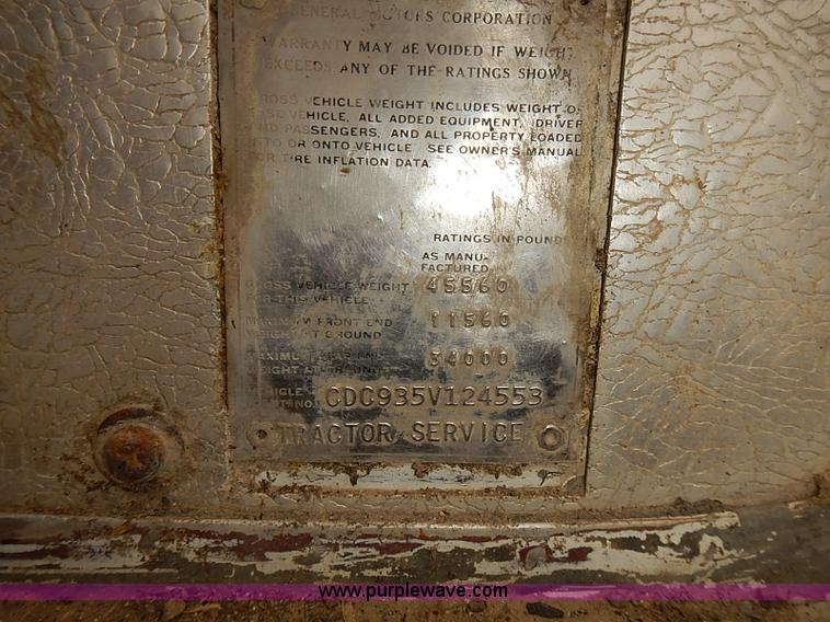 image for item J3092 1975 Chevrolet flatbed truck with crane