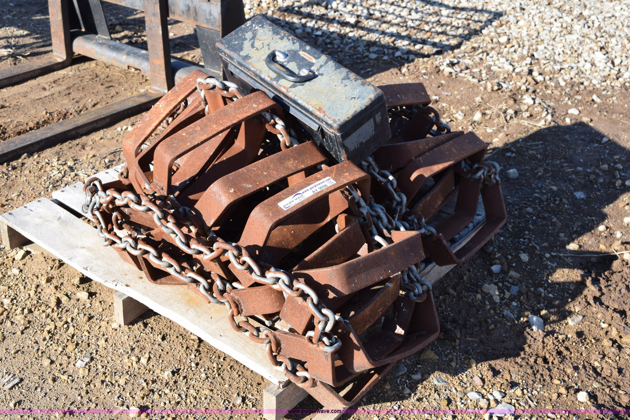 Over tire steel skid steer tracks in Lyons, KS Item AY9098 sold