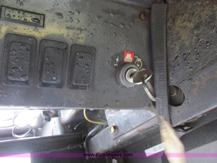 image for item H7679 2006 New Holland L160 Super boom skid steer