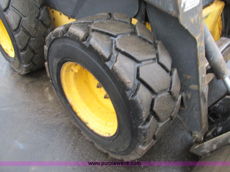 image for item H7679 2006 New Holland L160 Super boom skid steer