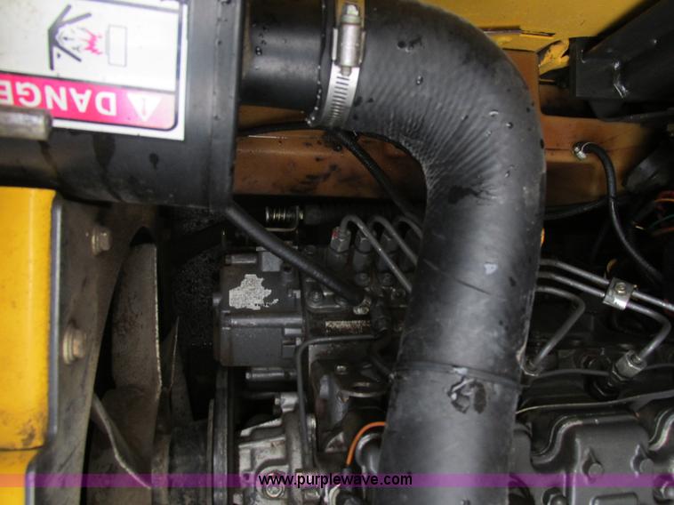 image for item H7679 2006 New Holland L160 Super boom skid steer