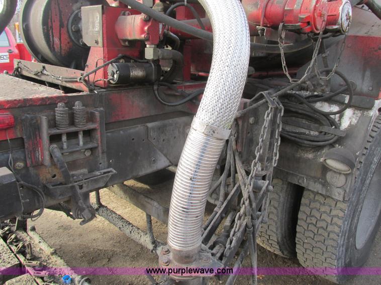 image for item H7680 1999 GMC C6500 oil distributor truck