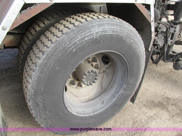 image for item H7680 1999 GMC C6500 oil distributor truck