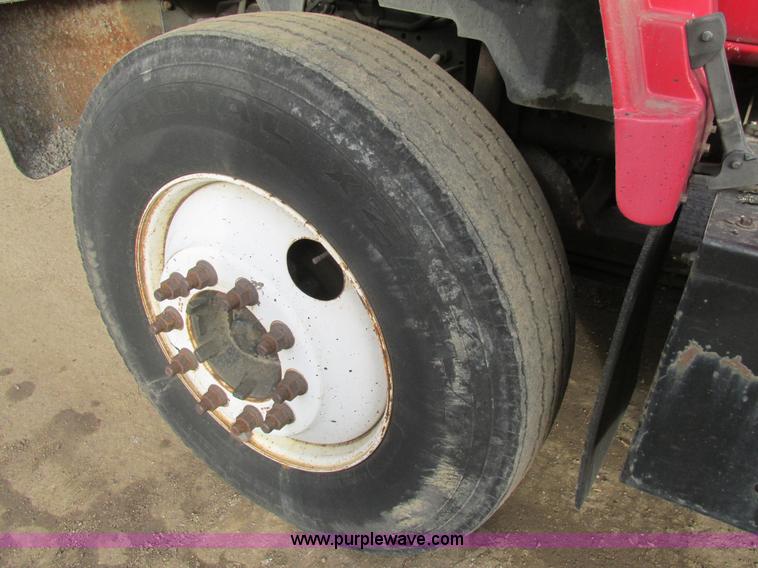 image for item H7680 1999 GMC C6500 oil distributor truck