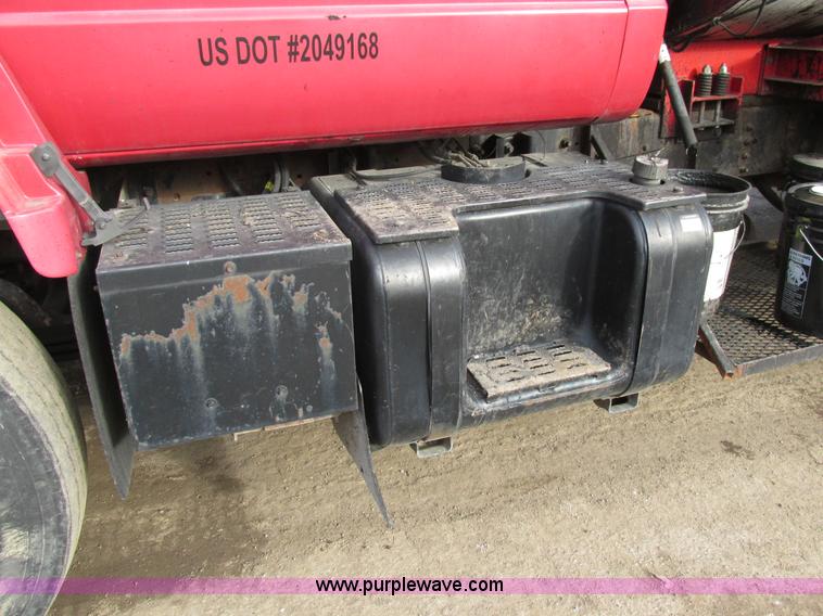 image for item H7680 1999 GMC C6500 oil distributor truck