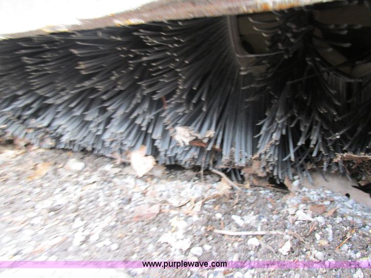 image for item H7681 Caterpillar BU115 skid steer broom