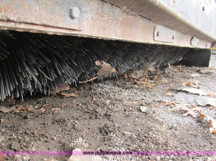 image for item H7681 Caterpillar BU115 skid steer broom