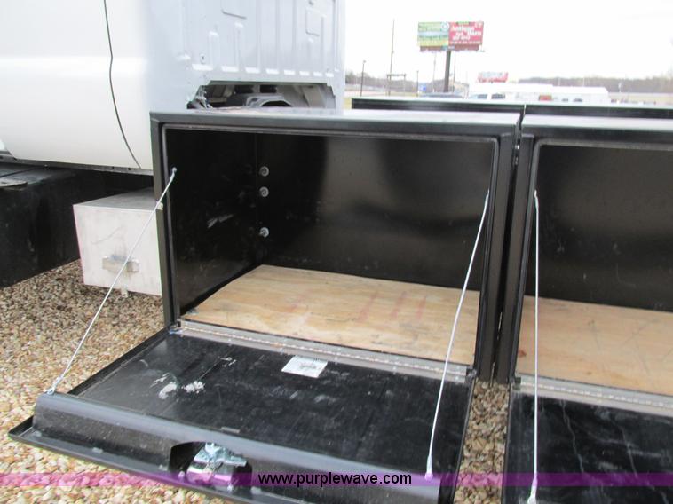 image for item H7687 2000 Ford F750 Super Duty XL Ext. Cab flatbed dump truck