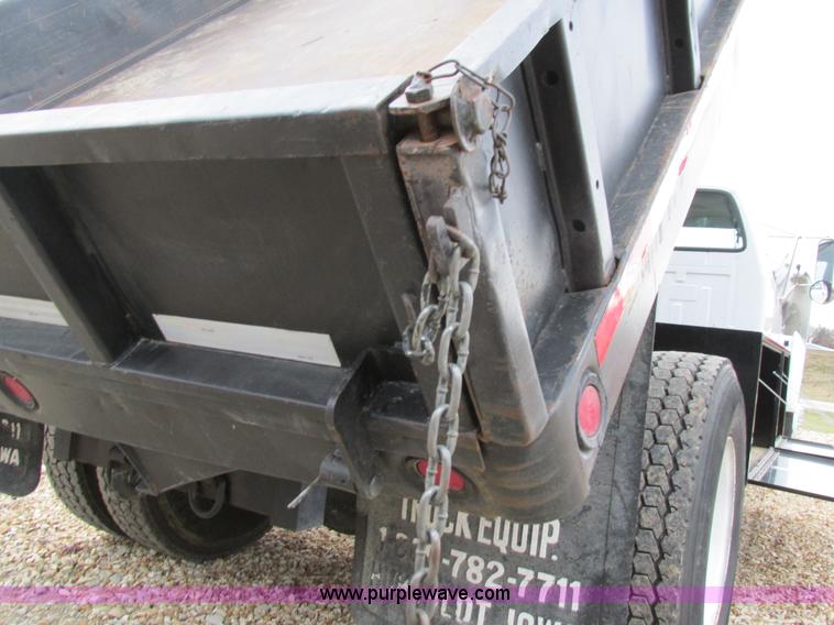 image for item H7687 2000 Ford F750 Super Duty XL Ext. Cab flatbed dump truck