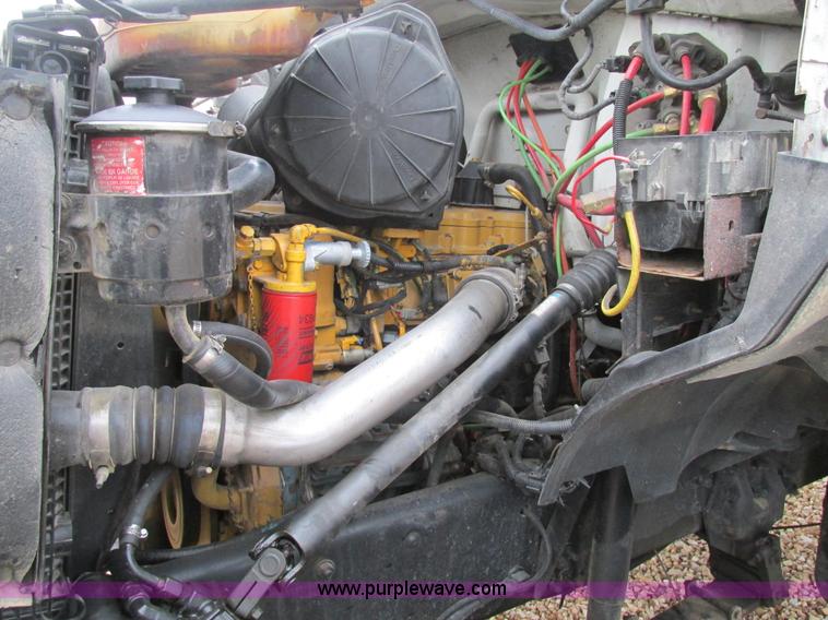 image for item H7687 2000 Ford F750 Super Duty XL Ext. Cab flatbed dump truck