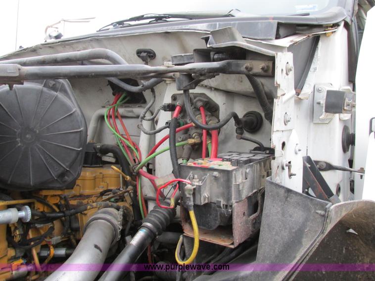 image for item H7687 2000 Ford F750 Super Duty XL Ext. Cab flatbed dump truck