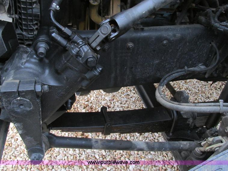 image for item H7687 2000 Ford F750 Super Duty XL Ext. Cab flatbed dump truck