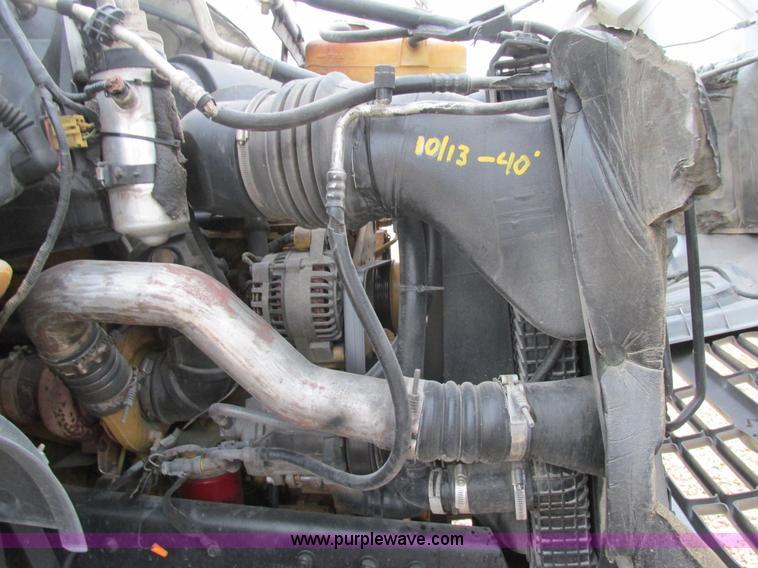 image for item H7687 2000 Ford F750 Super Duty XL Ext. Cab flatbed dump truck