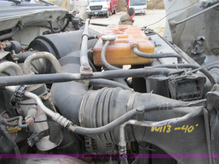 image for item H7687 2000 Ford F750 Super Duty XL Ext. Cab flatbed dump truck