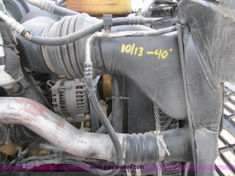 image for item H7687 2000 Ford F750 Super Duty XL Ext. Cab flatbed dump truck