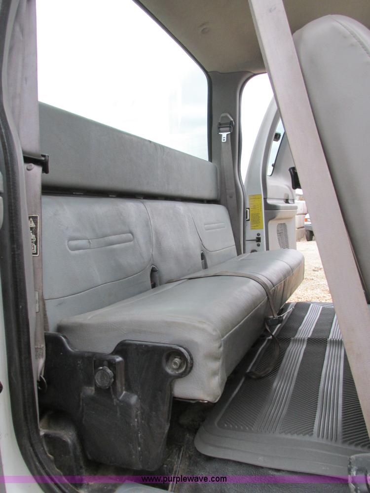 image for item H7687 2000 Ford F750 Super Duty XL Ext. Cab flatbed dump truck