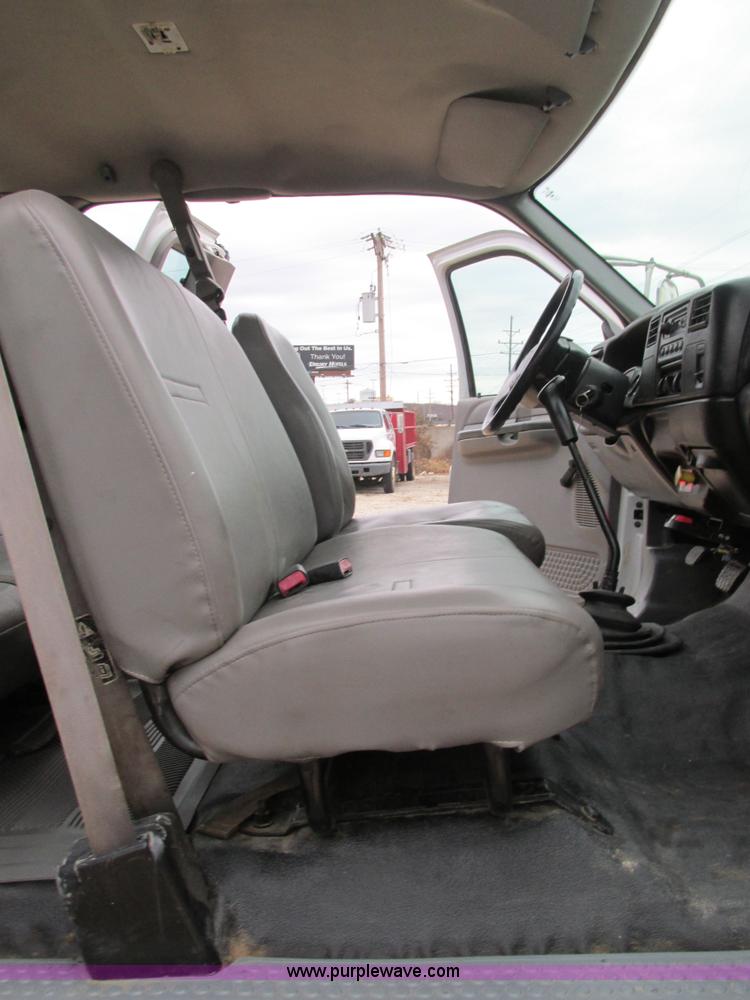 image for item H7687 2000 Ford F750 Super Duty XL Ext. Cab flatbed dump truck