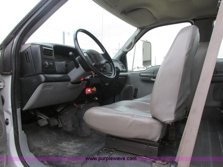 image for item H7687 2000 Ford F750 Super Duty XL Ext. Cab flatbed dump truck