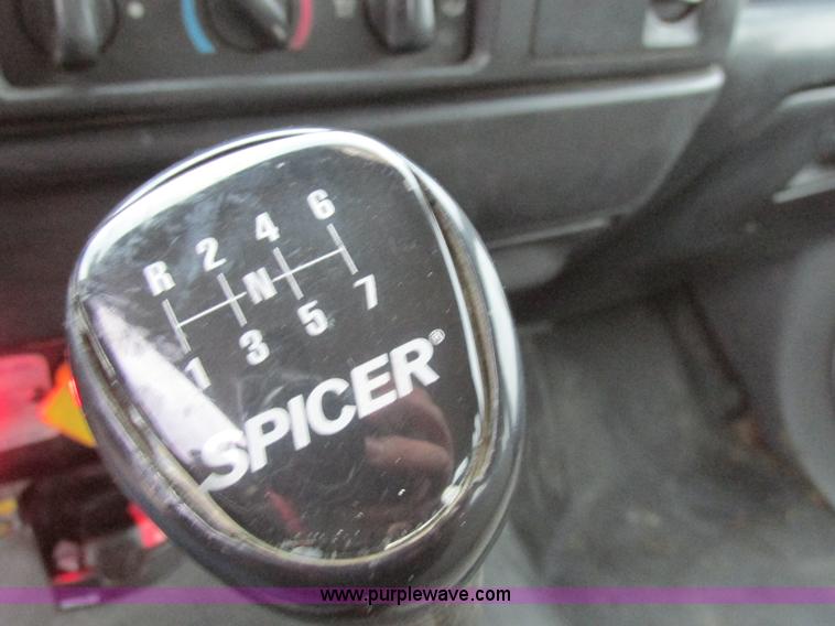 image for item H7687 2000 Ford F750 Super Duty XL Ext. Cab flatbed dump truck