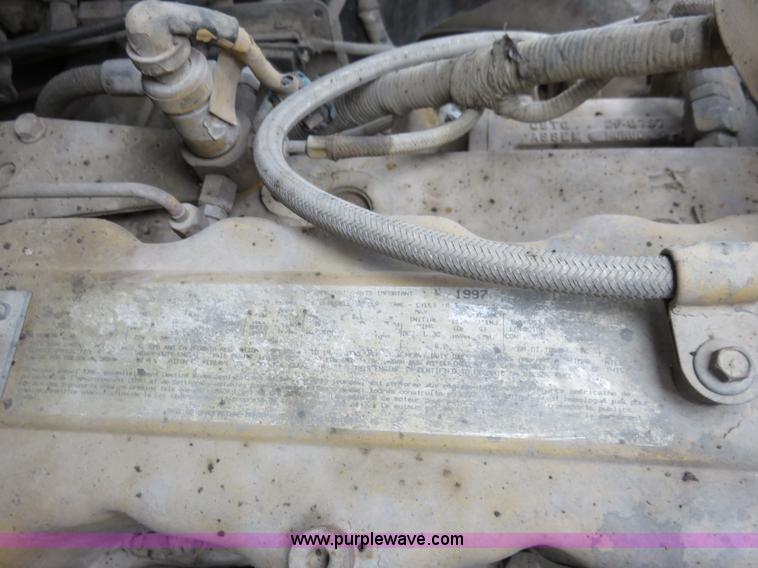 image for item I2399 1998 Ford HLT9513 dump truck