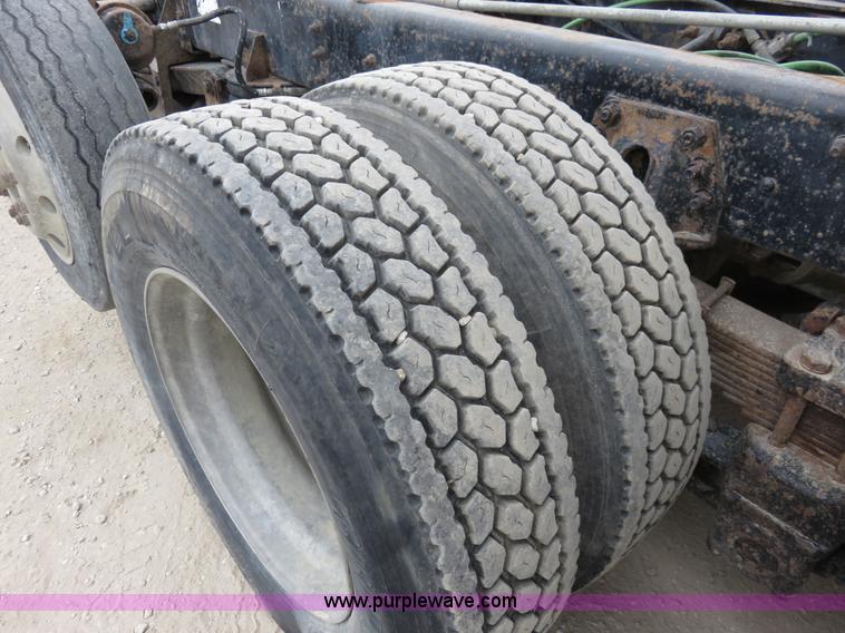 image for item I2399 1998 Ford HLT9513 dump truck