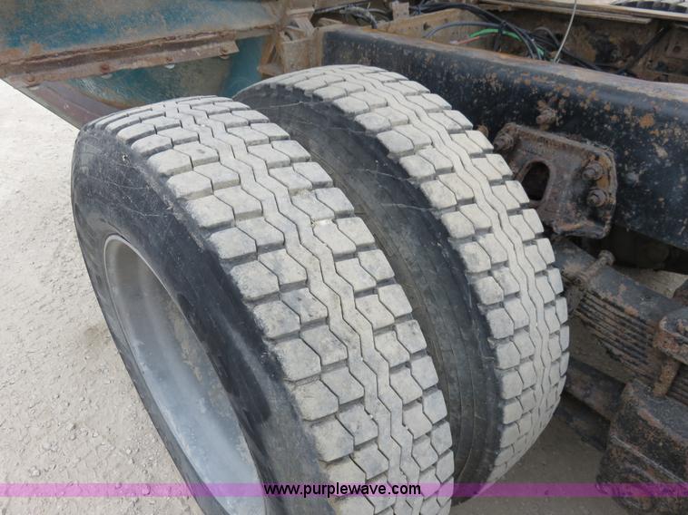 image for item I2399 1998 Ford HLT9513 dump truck