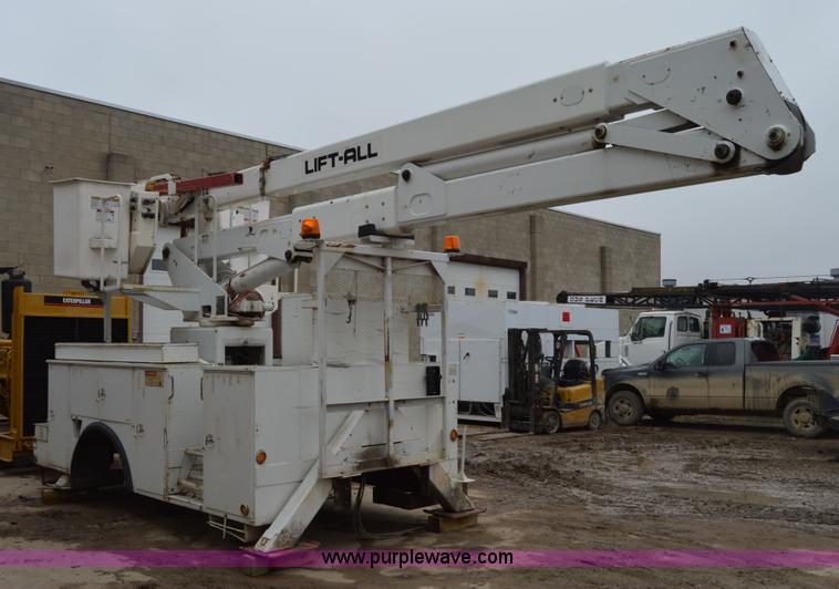 image for item I6933 2002 Liftall LOM-50-2S material handler boom lift